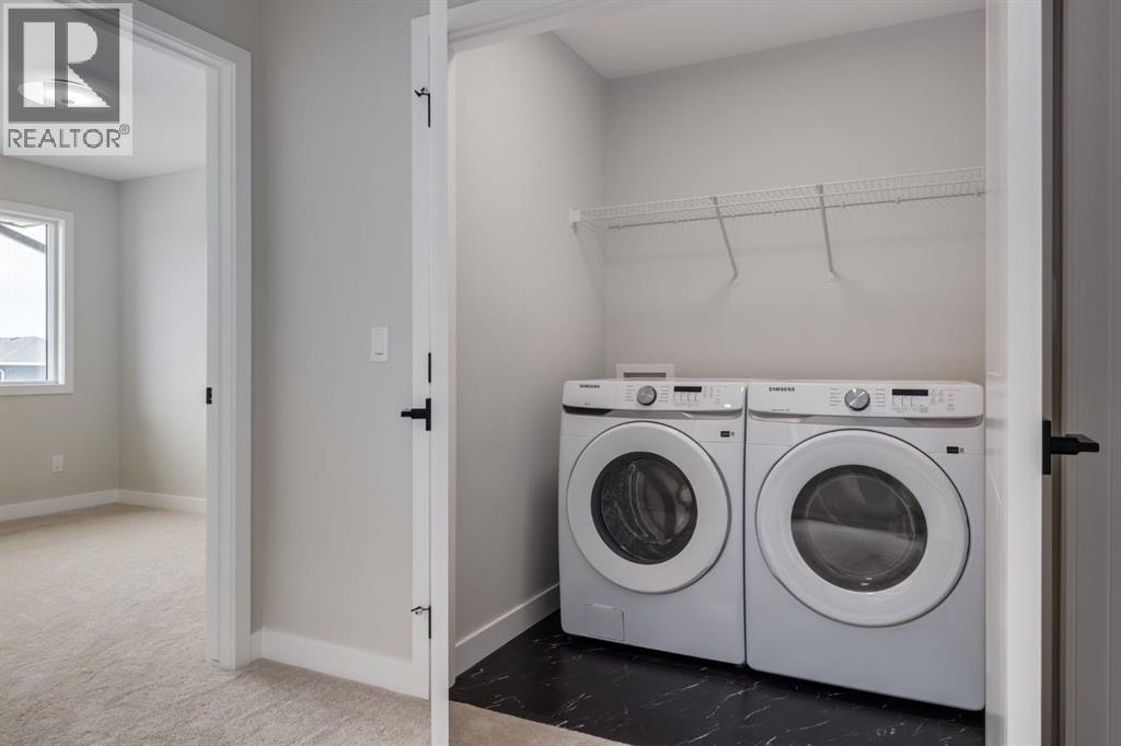 780 Sora Boulevard Se, Calgary, AB - Indoor Photo Showing Laundry Room
