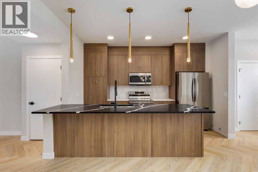 780 Sora Boulevard Se, Calgary, AB - Indoor Photo Showing Kitchen With Upgraded Kitchen