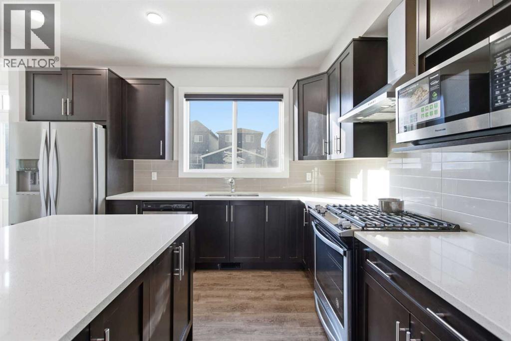 61 Savanna Link Ne, Calgary, AB - Indoor Photo Showing Kitchen With Upgraded Kitchen