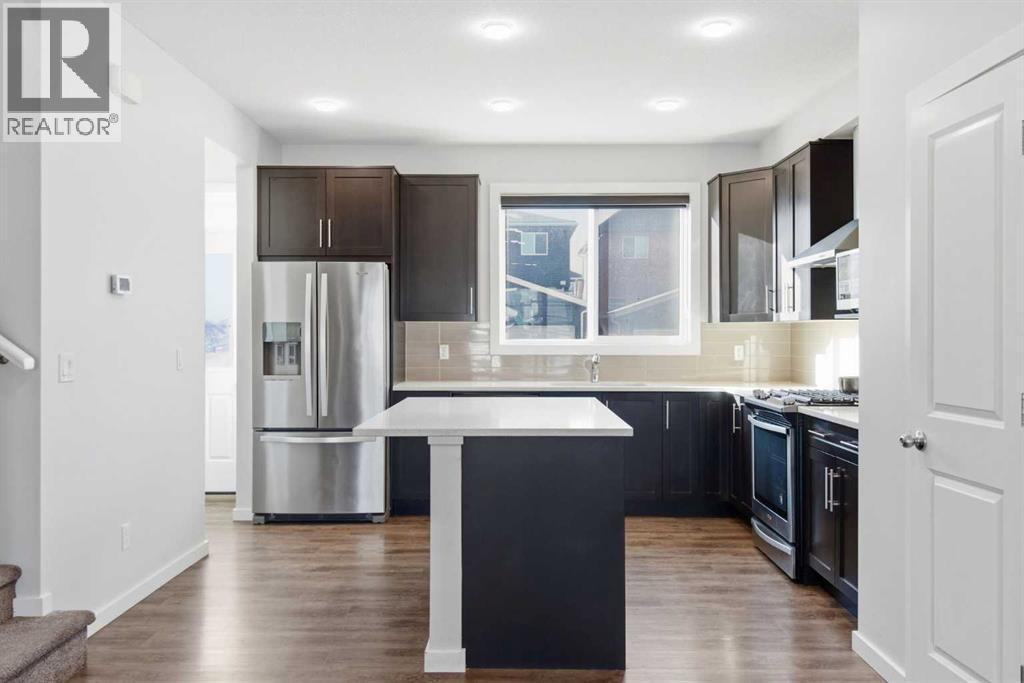 61 Savanna Link Ne, Calgary, AB - Indoor Photo Showing Kitchen With Upgraded Kitchen