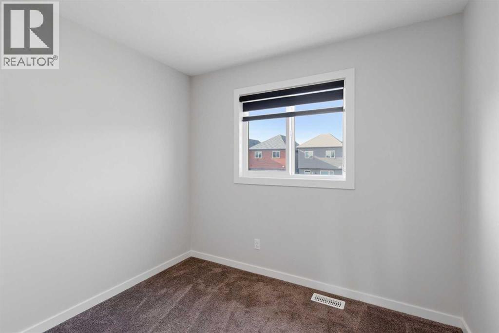 61 Savanna Link Ne, Calgary, AB - Indoor Photo Showing Other Room