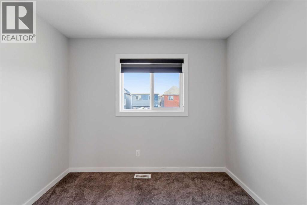 61 Savanna Link Ne, Calgary, AB - Indoor Photo Showing Other Room