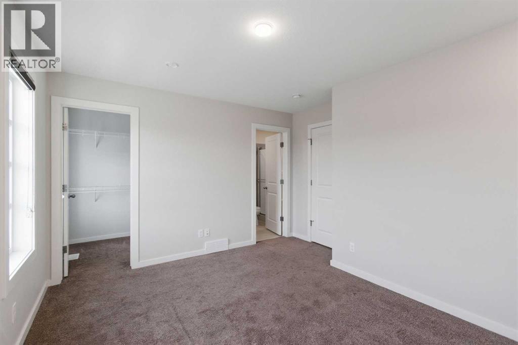 61 Savanna Link Ne, Calgary, AB - Indoor Photo Showing Other Room