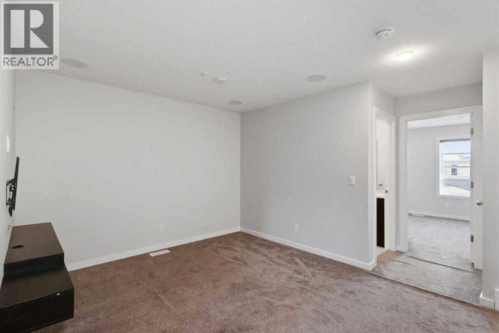 61 Savanna Link Ne, Calgary, AB - Indoor Photo Showing Other Room