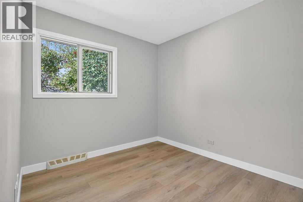 Bedroom - 5923 Centre Street Nw, Calgary, AB - Indoor Photo Showing Other Room