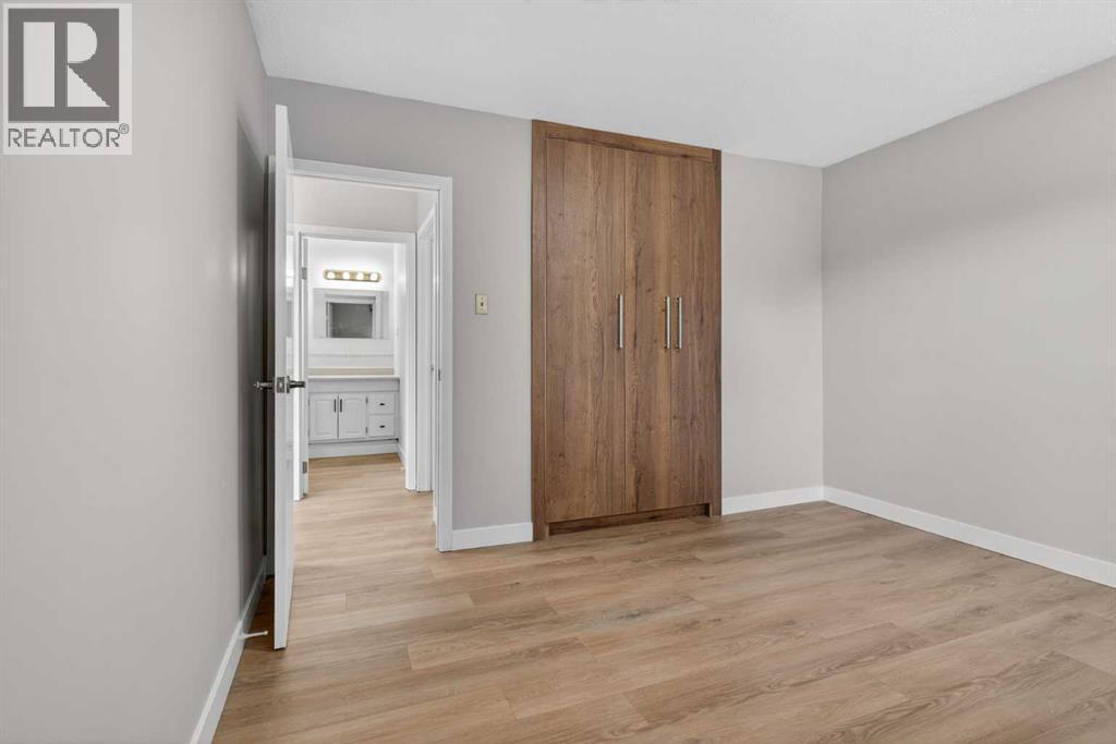 Primary Bedroom - 5923 Centre Street Nw, Calgary, AB - Indoor Photo Showing Other Room