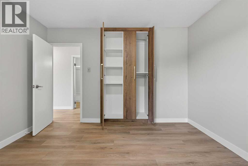 Primary Bedroom - 5923 Centre Street Nw, Calgary, AB - Indoor Photo Showing Other Room