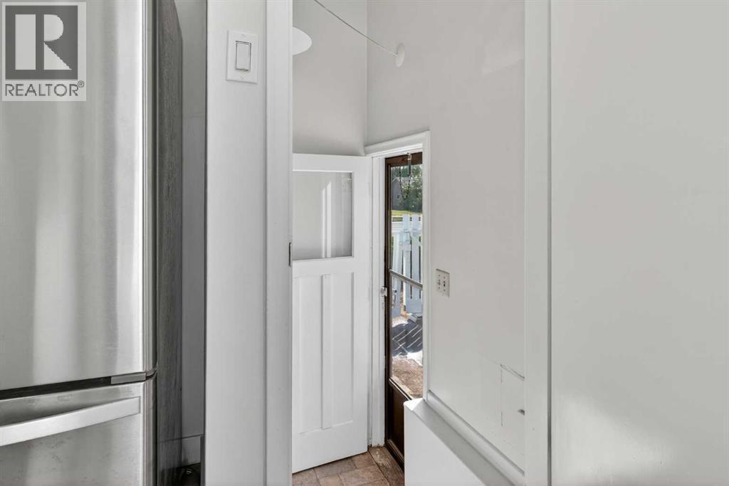 Side entrance from mainfloor kitchen - 5923 Centre Street Nw, Calgary, AB - Indoor