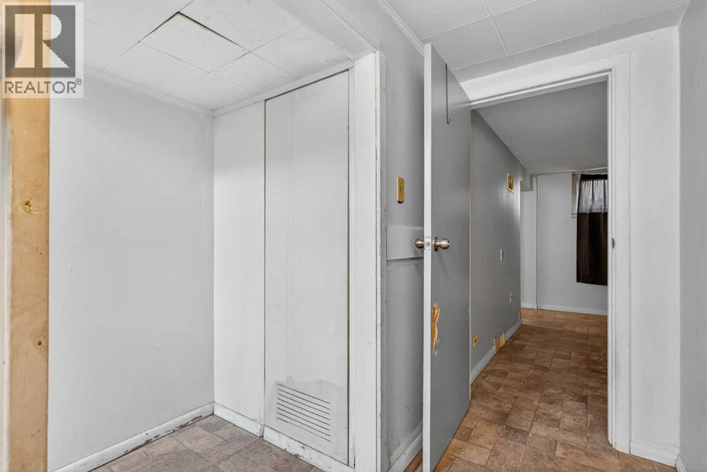 Basement Hallway - 5923 Centre Street Nw, Calgary, AB - Indoor Photo Showing Other Room