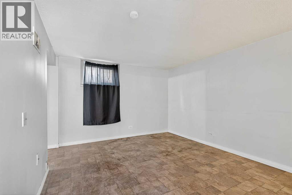 Basement living room - 5923 Centre Street Nw, Calgary, AB - Indoor Photo Showing Other Room
