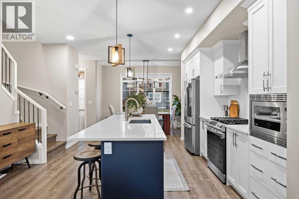 Kitchen - 80 Wolf Gate, Okotoks, AB - Indoor Photo Showing Kitchen With Upgraded Kitchen
