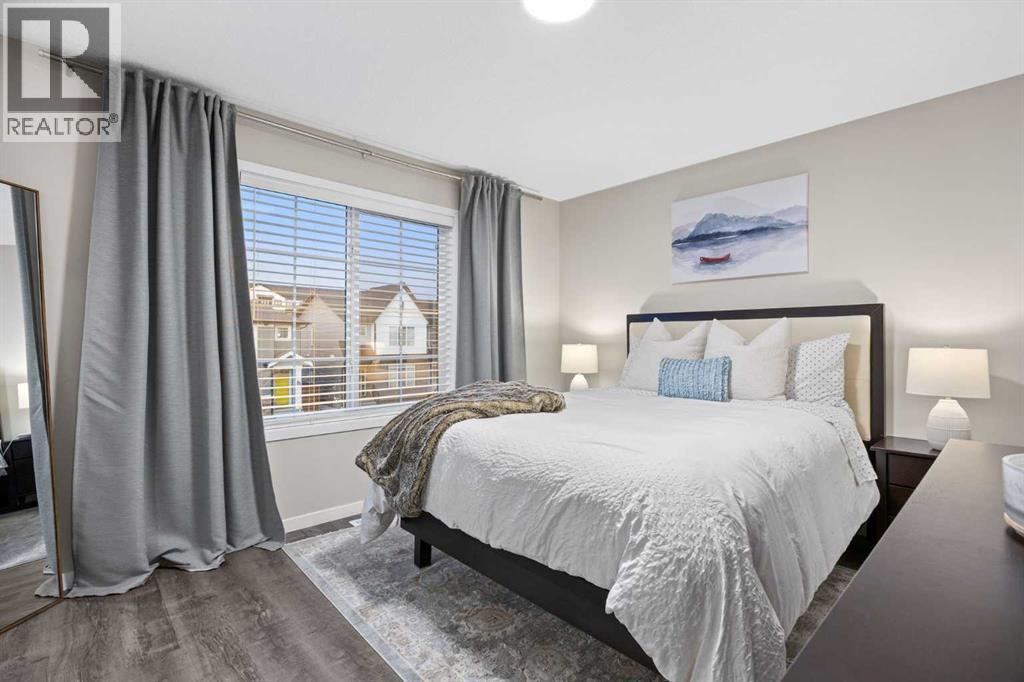 Bedroom 2 - 80 Wolf Gate, Okotoks, AB - Indoor Photo Showing Bedroom