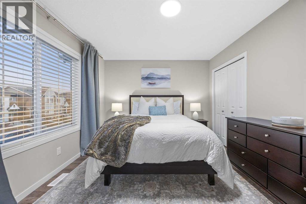 Bedroom 2 - 80 Wolf Gate, Okotoks, AB - Indoor Photo Showing Bedroom