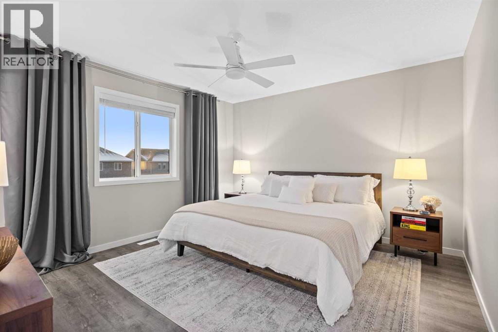 Primary Bedroom - 80 Wolf Gate, Okotoks, AB - Indoor Photo Showing Bedroom