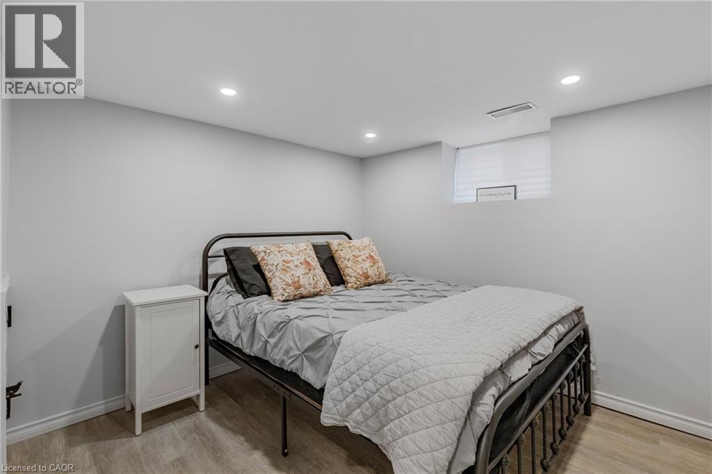 Bedroom with recessed lighting and light wood-style floors - 191 East 11Th Street, Hamilton, ON - Indoor Photo Showing Bedroom
