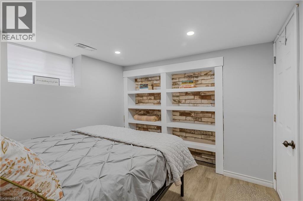 Bedroom featuring light wood finished floors and recessed lighting - 191 East 11Th Street, Hamilton, ON - Indoor Photo Showing Bedroom