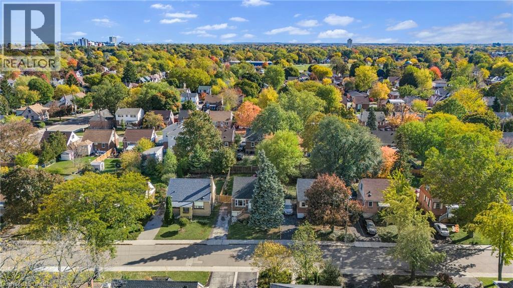 Aerial view of property's location featuring nearby suburban area and a tree filled landscape - 191 East 11Th Street, Hamilton, ON - Outdoor With View