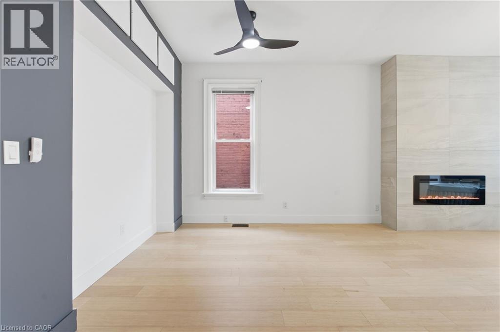 200 East Avenue N, Hamilton, ON - Indoor Photo Showing Other Room With Fireplace