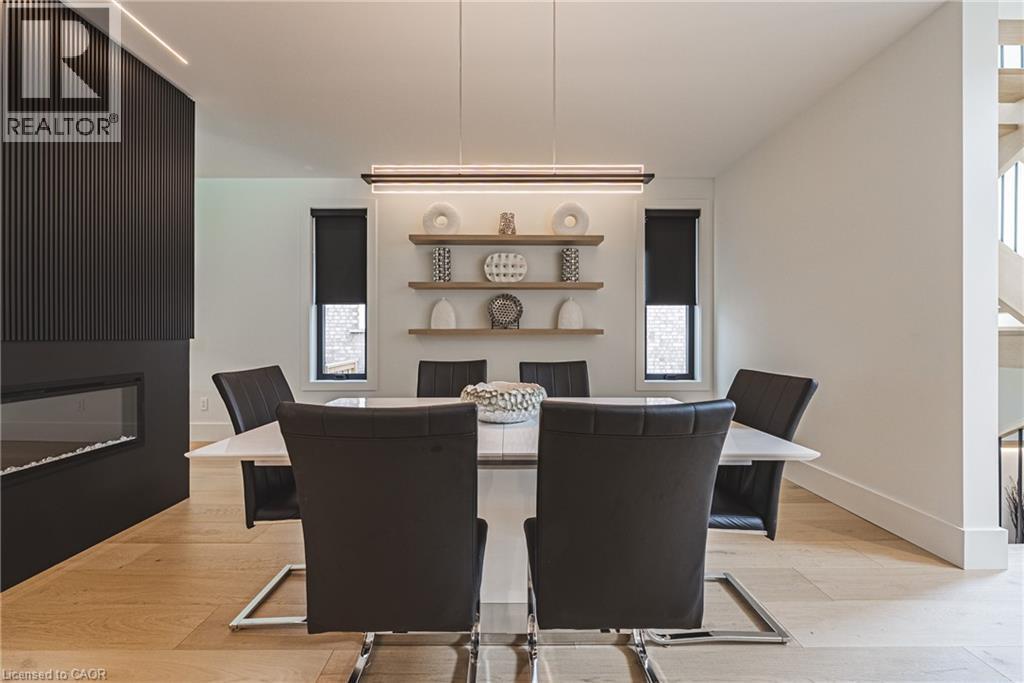 135 Eleanor Avenue, Hamilton, ON - Indoor Photo Showing Dining Room With Fireplace