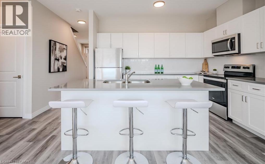 66 Ayr Meadows Crescent, Ayr, ON - Indoor Photo Showing Kitchen With Double Sink With Upgraded Kitchen
