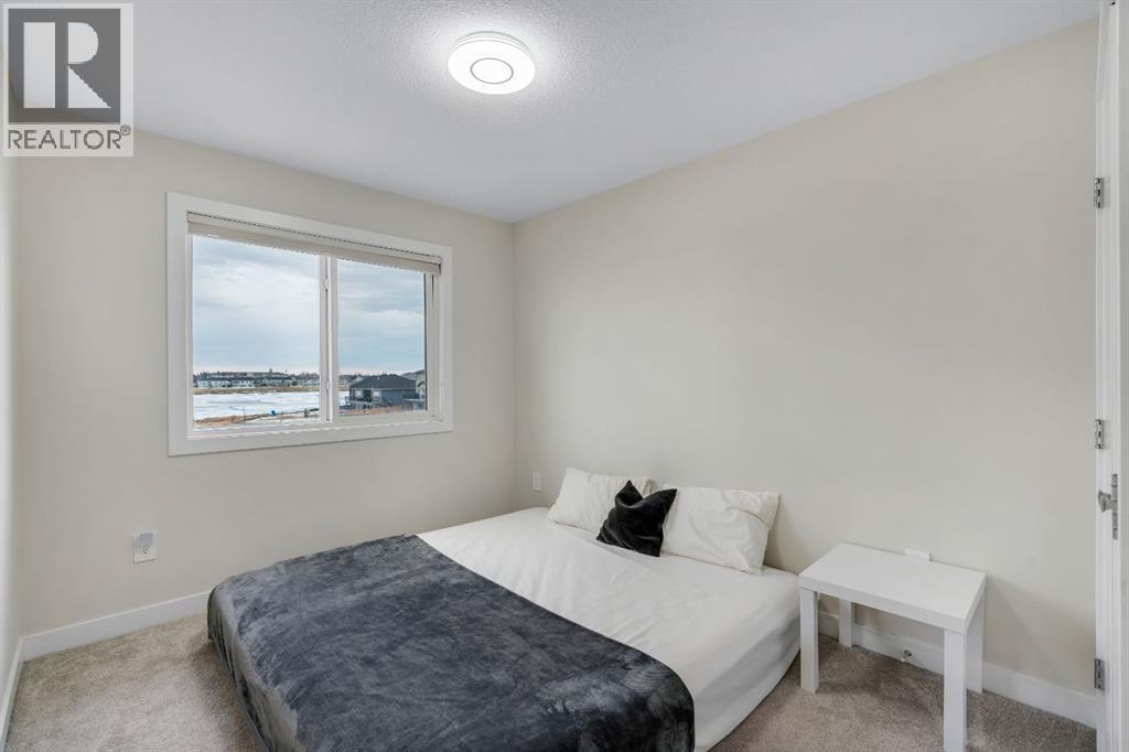 1222 Westmount Drive, Strathmore, AB - Indoor Photo Showing Bedroom