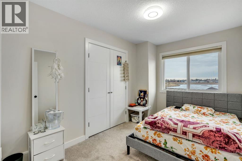 1222 Westmount Drive, Strathmore, AB - Indoor Photo Showing Bedroom
