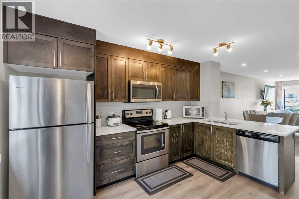 142 Red Embers Gate Ne, Calgary, AB - Indoor Photo Showing Kitchen With Stainless Steel Kitchen With Double Sink
