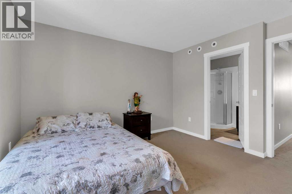 142 Red Embers Gate Ne, Calgary, AB - Indoor Photo Showing Bedroom
