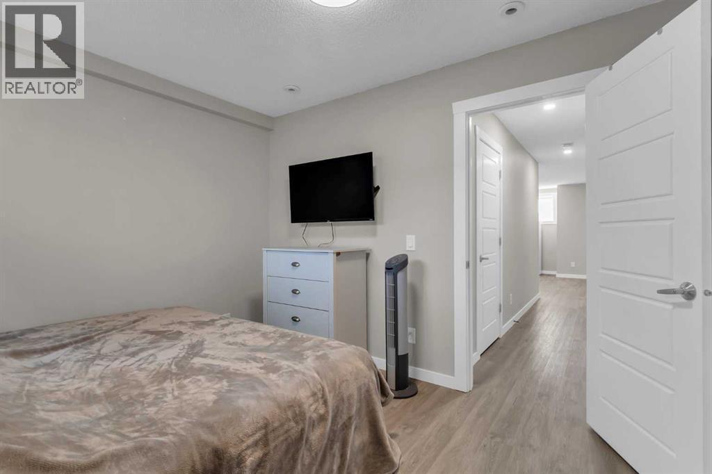 142 Red Embers Gate Ne, Calgary, AB - Indoor Photo Showing Bedroom