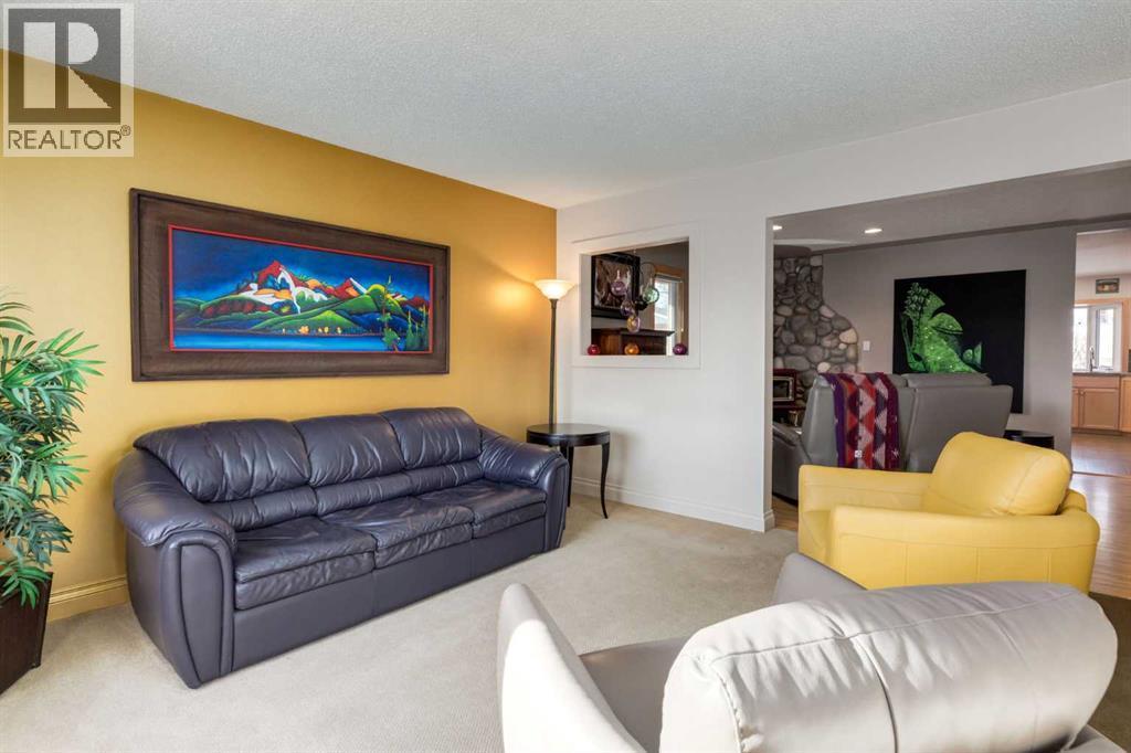 55 Heston Street Nw, Calgary, AB - Indoor Photo Showing Living Room