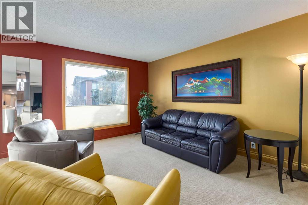 55 Heston Street Nw, Calgary, AB - Indoor Photo Showing Living Room