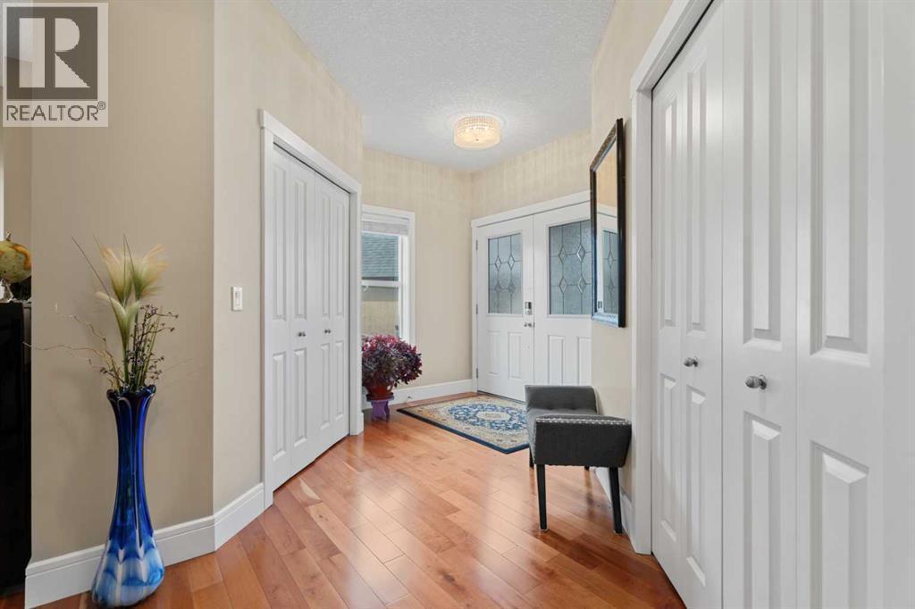 Large foyer with two closets - 113 Aspen Stone Place Sw, Calgary, AB - Indoor Photo Showing Other Room