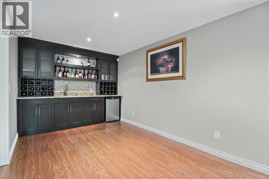 Wet bar in the basement - 113 Aspen Stone Place Sw, Calgary, AB - Indoor
