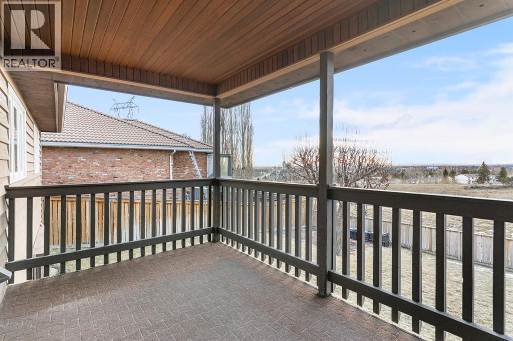 39 Coach Gate Way Sw, Calgary, AB - Outdoor With Deck Patio Veranda With Exterior