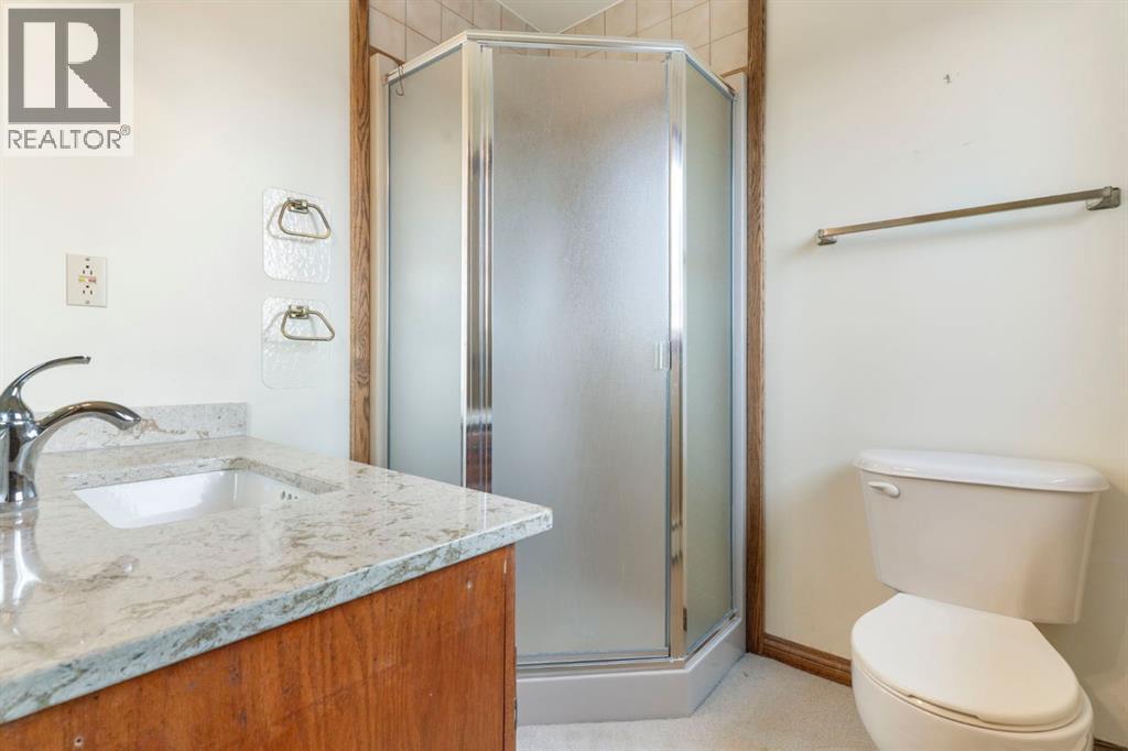 ensuite - 39 Coach Gate Way Sw, Calgary, AB - Indoor Photo Showing Bathroom