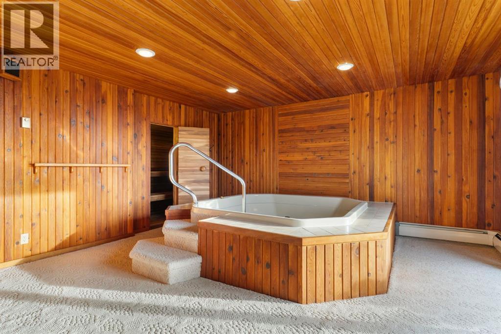 39 Coach Gate Way Sw, Calgary, AB - Indoor Photo Showing Other Room