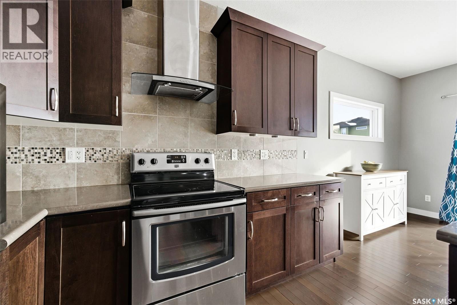 2813 Elgaard Drive, Regina, SK - Indoor Photo Showing Kitchen With Stainless Steel Kitchen With Upgraded Kitchen
