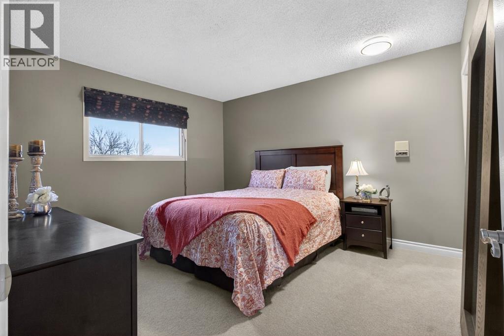 68 Bermondsey Rise Nw, Calgary, AB - Indoor Photo Showing Bedroom