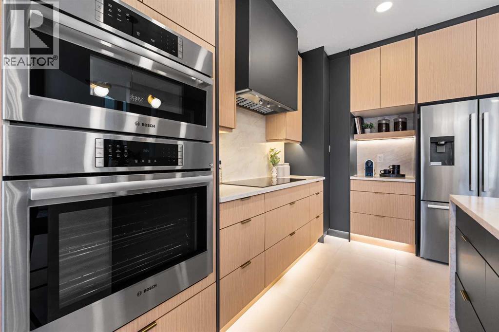 125 Discovery Place Sw, Calgary, AB - Indoor Photo Showing Kitchen With Stainless Steel Kitchen
