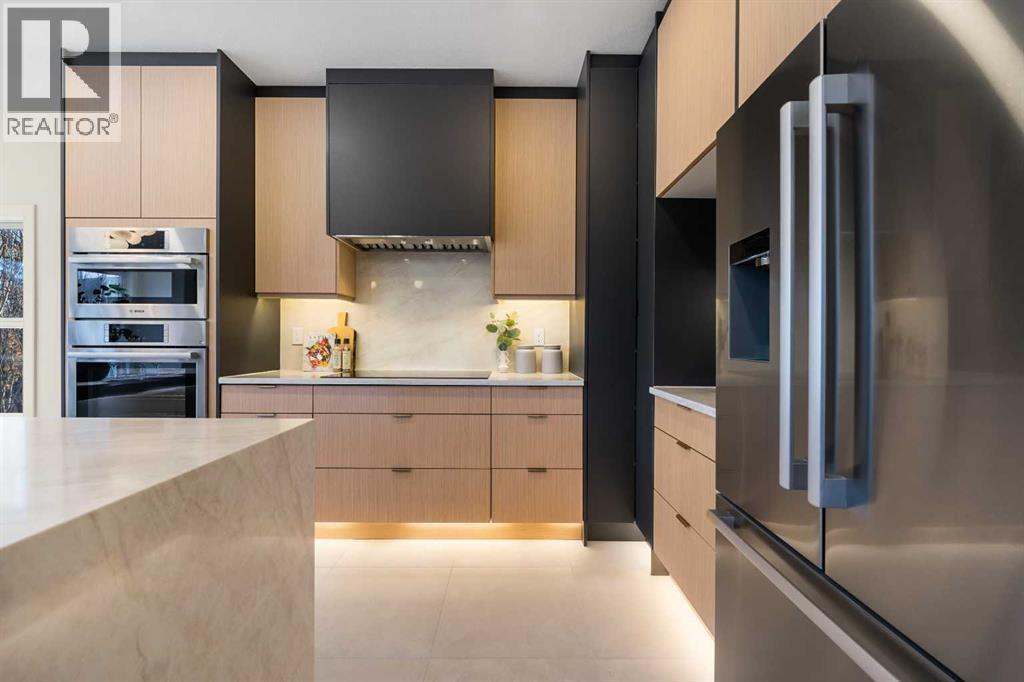 125 Discovery Place Sw, Calgary, AB - Indoor Photo Showing Kitchen With Stainless Steel Kitchen With Upgraded Kitchen