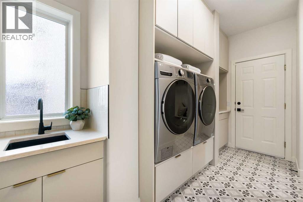 125 Discovery Place Sw, Calgary, AB - Indoor Photo Showing Laundry Room