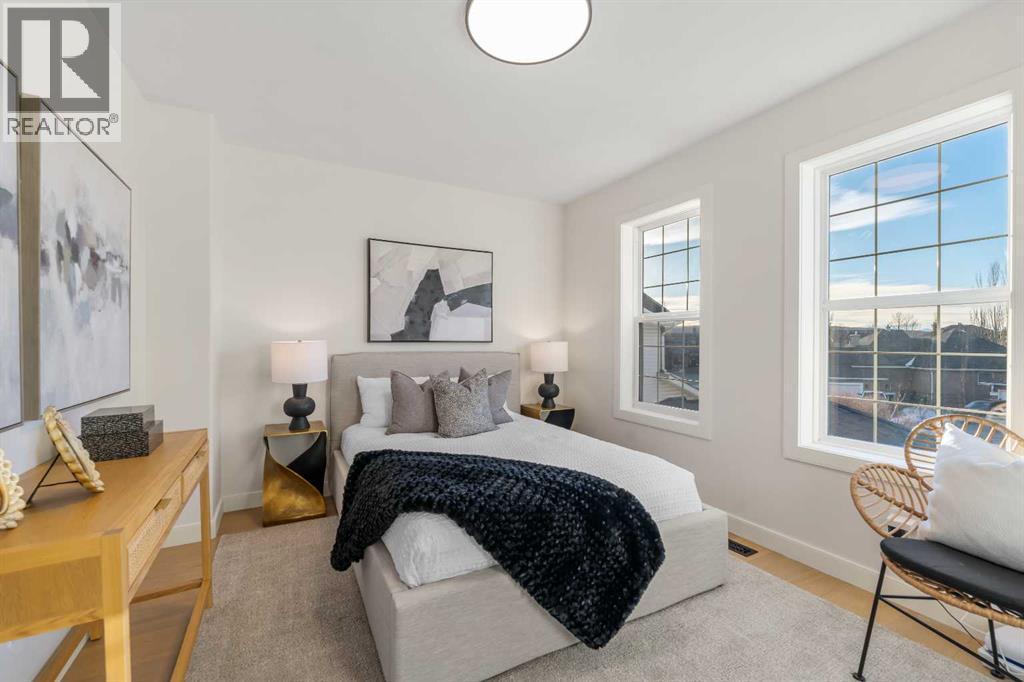 125 Discovery Place Sw, Calgary, AB - Indoor Photo Showing Bedroom