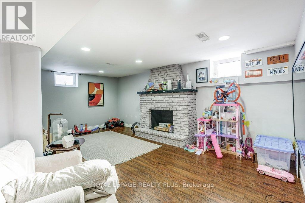 1980 Hartland Drive, Mississauga, ON - Indoor Photo Showing Basement With Fireplace