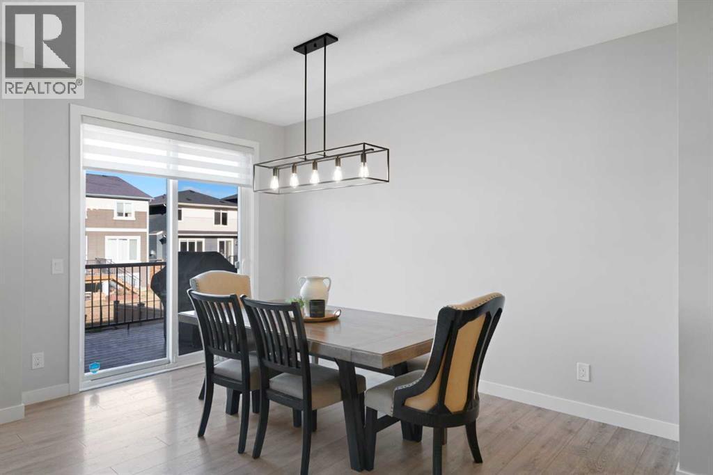 96 Emberside Glen, Cochrane, AB - Indoor Photo Showing Dining Room