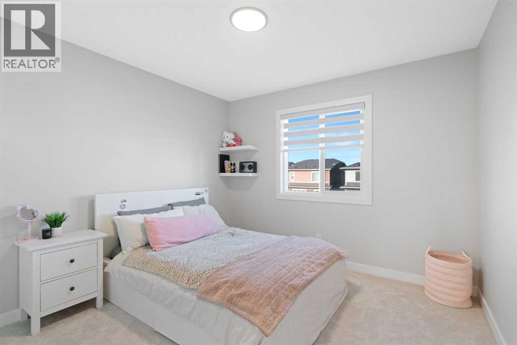 96 Emberside Glen, Cochrane, AB - Indoor Photo Showing Bedroom