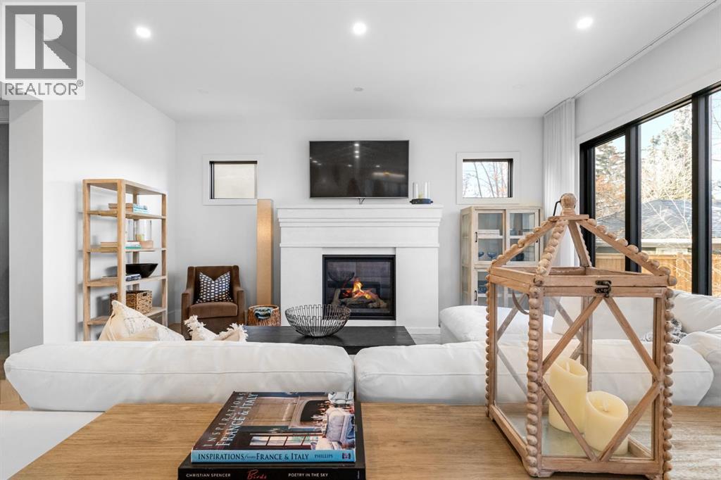 1604 48 Avenue Sw, Calgary, AB - Indoor Photo Showing Living Room With Fireplace