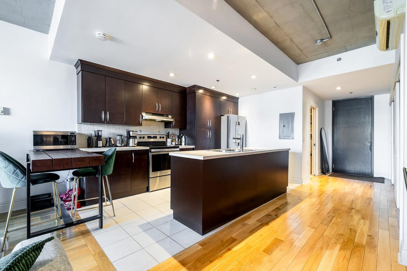 Salle à manger - 209-5255 Av. Du Parc, Montréal (Le Plateau-Mont-Royal), QC - Indoor Photo Showing Kitchen With Upgraded Kitchen