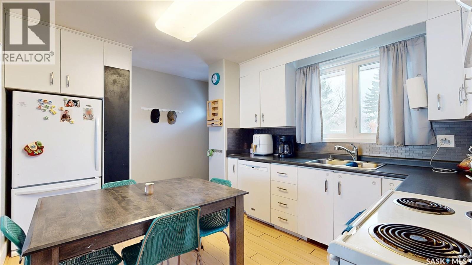 2231 Dewdney Avenue E, Regina, SK - Indoor Photo Showing Kitchen With Double Sink
