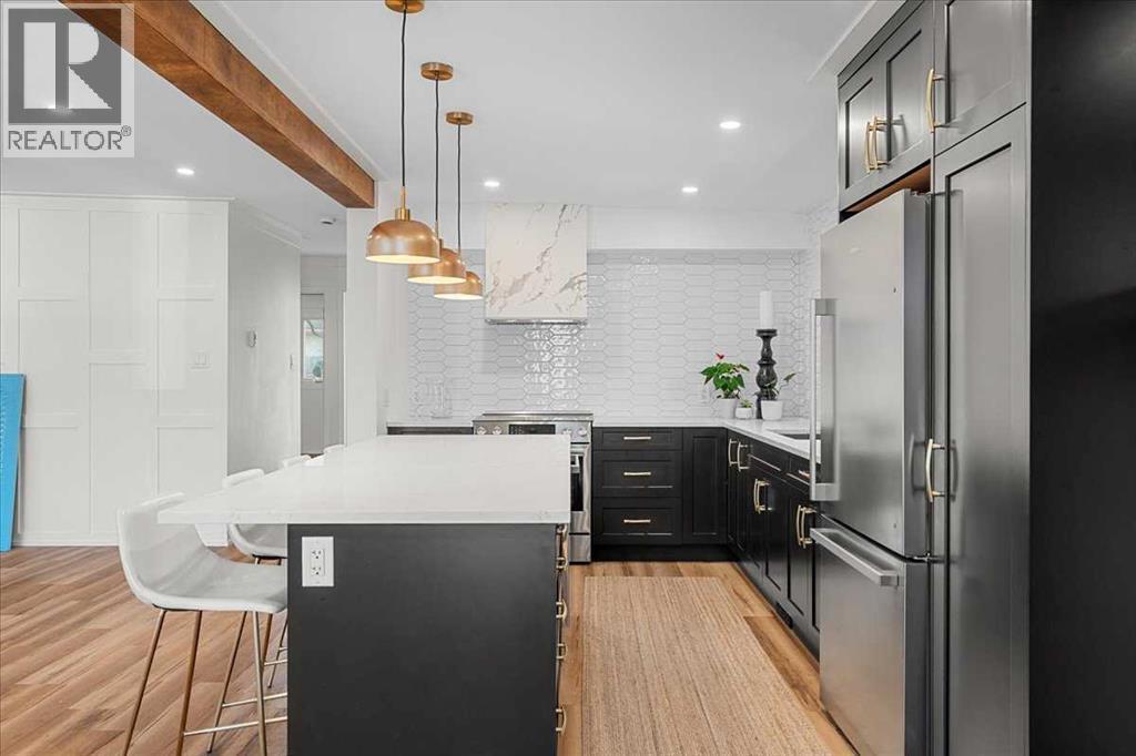 Main Floor - 2023 35 Avenue Sw, Calgary, AB - Indoor Photo Showing Kitchen With Upgraded Kitchen