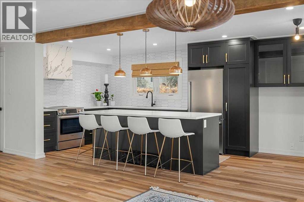 Main Floor - 2023 35 Avenue Sw, Calgary, AB - Indoor Photo Showing Kitchen With Upgraded Kitchen